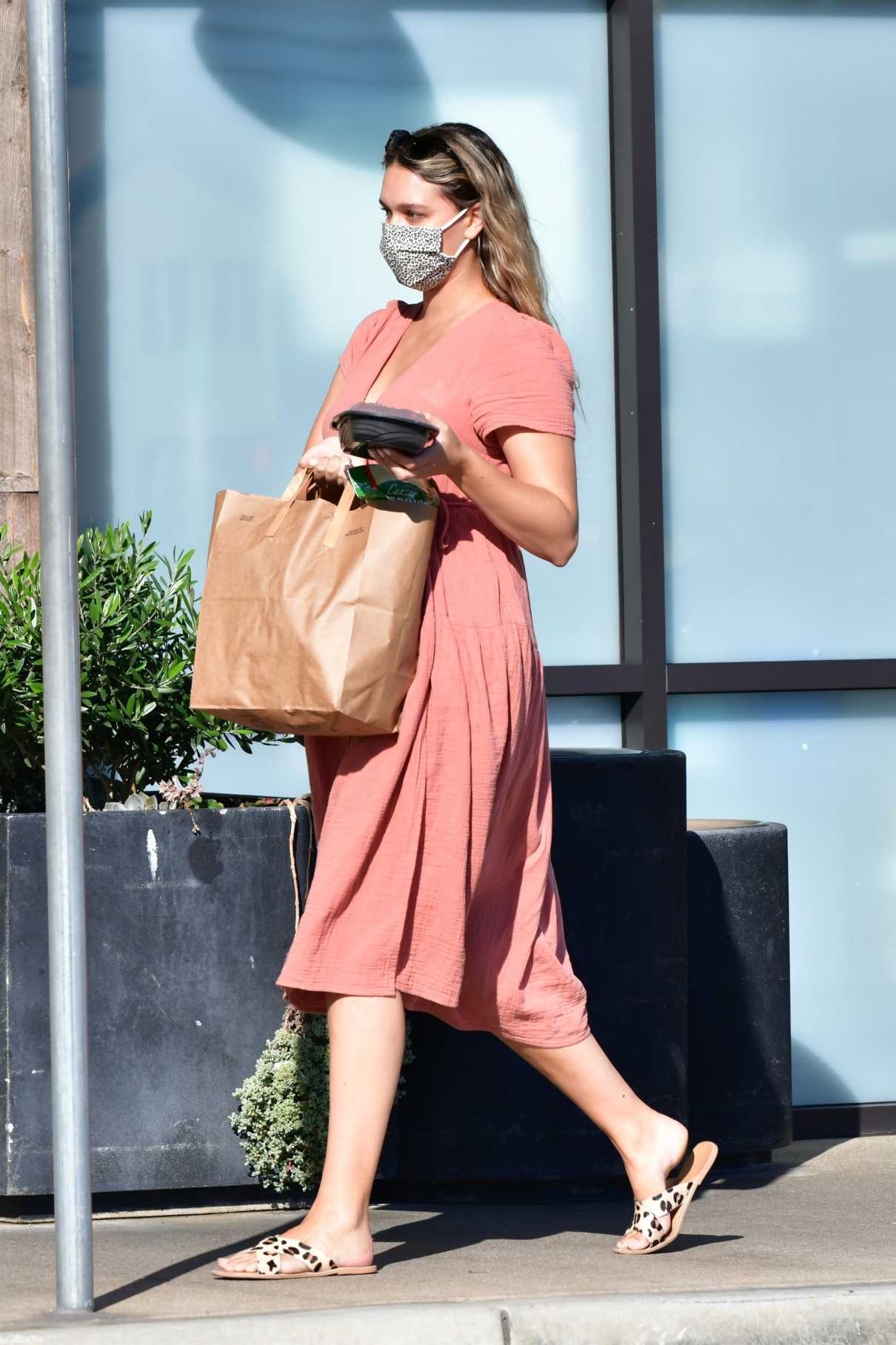 April Love Geary in a Pink Dress