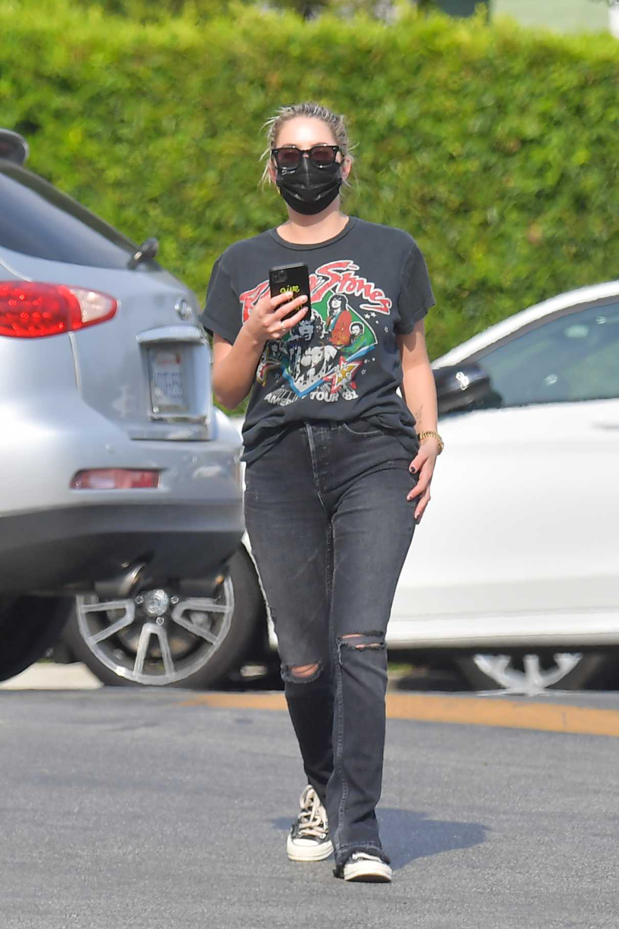 Ashley Benson in a Black Protective Mask