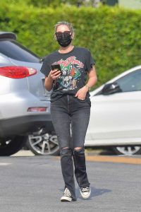 Ashley Benson in a Black Protective Mask