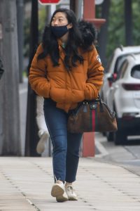 Awkwafina in an Orange Jacket