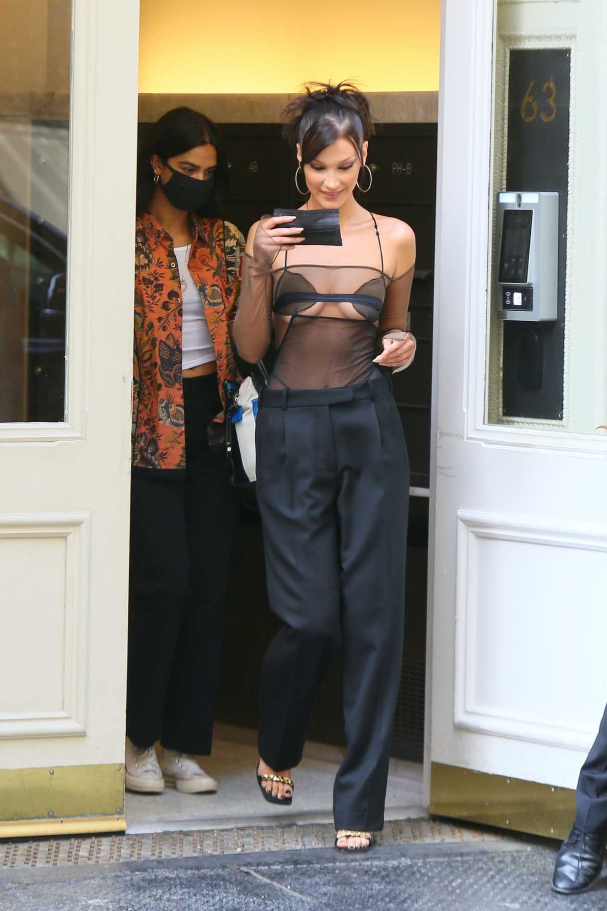 Bella Hadid in a Black See-Through Blouse