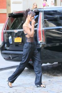 Bella Hadid in a Black See-Through Blouse