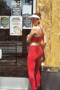 Blanca Blanco in a Red Sports Bra
