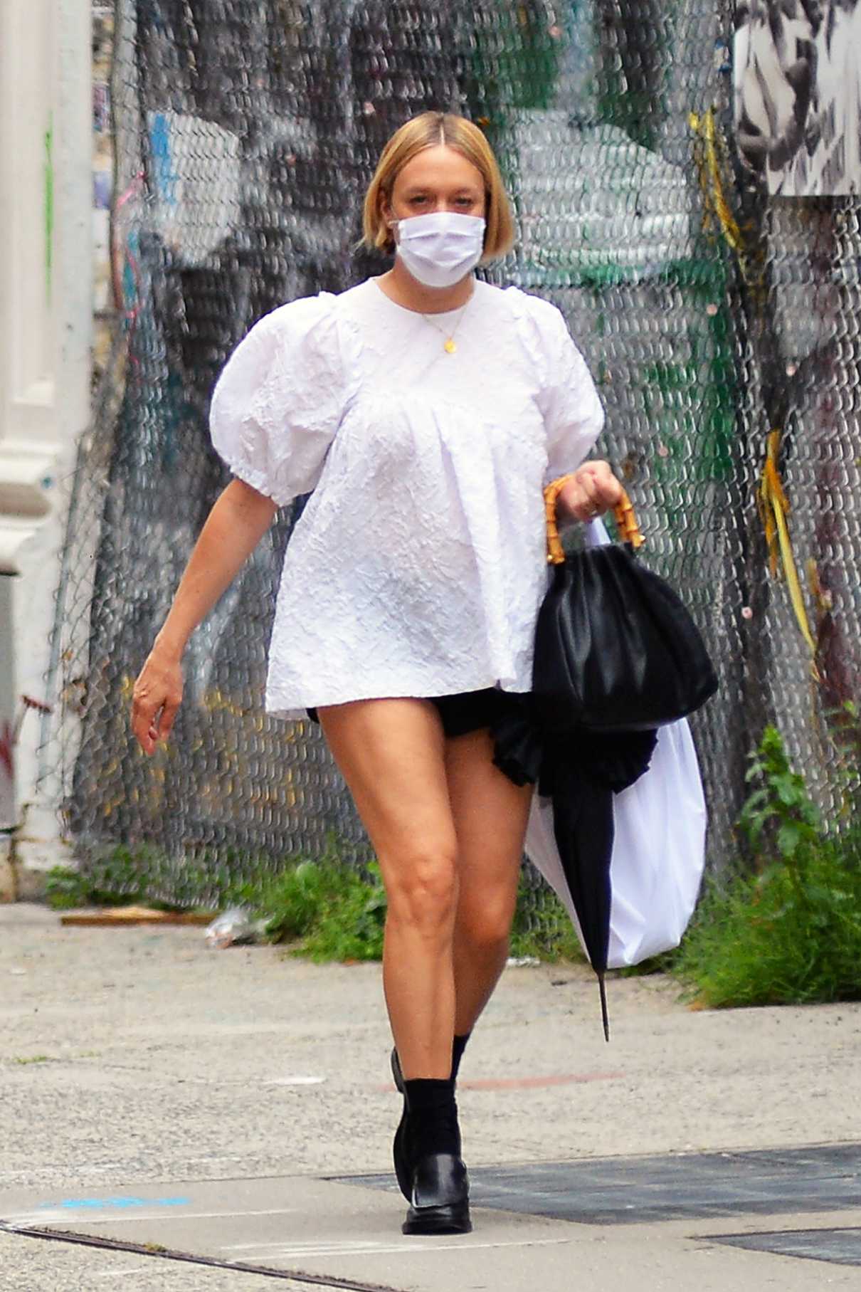 Chloe Sevigny in a Protective Mask