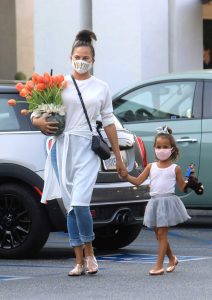 Chrissy Teigen in a Protective Mask