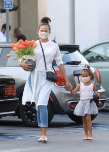 Chrissy Teigen in a Protective Mask