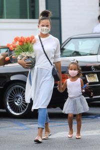 Chrissy Teigen in a Protective Mask