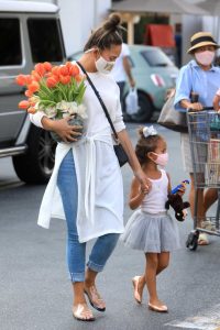 Chrissy Teigen in a Protective Mask