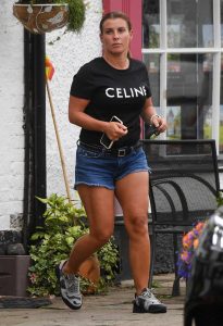 Coleen Rooney in a Black Tee