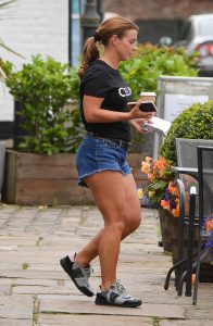 Coleen Rooney in a Black Tee