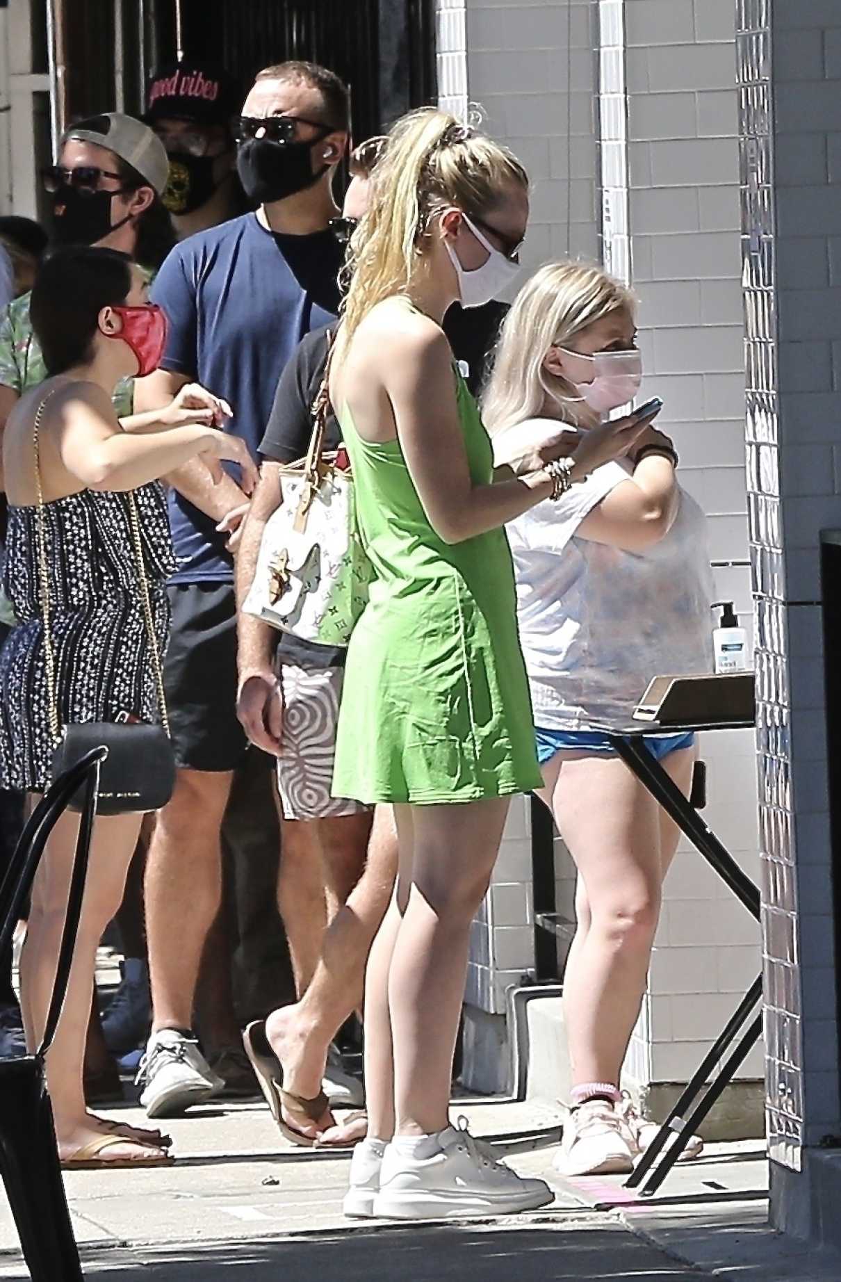 Dakota Fanning in a Neon Green Mini Dress
