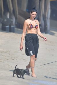 Dua Lipa in a Black Bikini Top