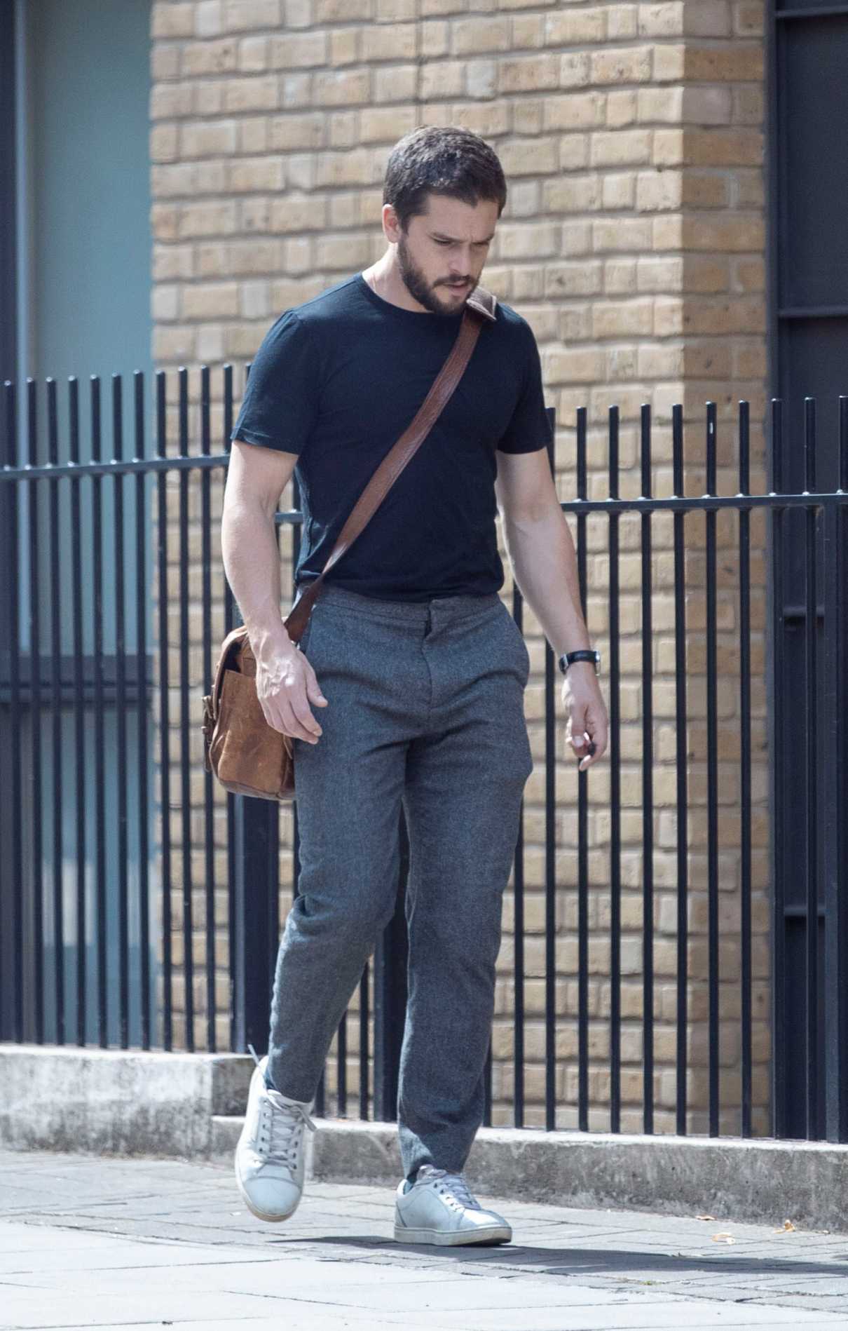 Kit Harrington in a Black Tee