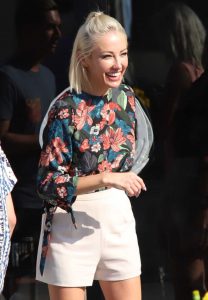 Mary Fitzgerald in a Floral Blouse