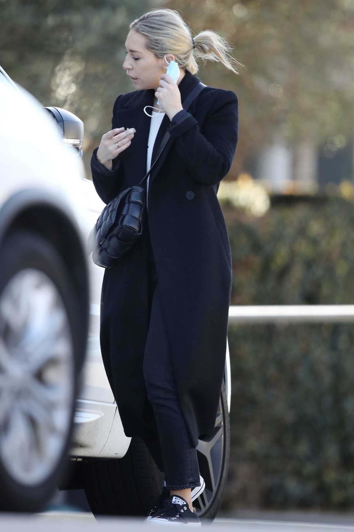 Phoebe Burgess in a Protective Mask