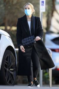 Phoebe Burgess in a Protective Mask