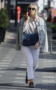 Phoebe Burgess in a White Jeans