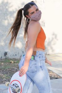 Addison Rae in an Orange Top