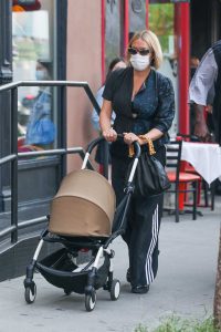 Chloe Sevigny in a Protective Mask