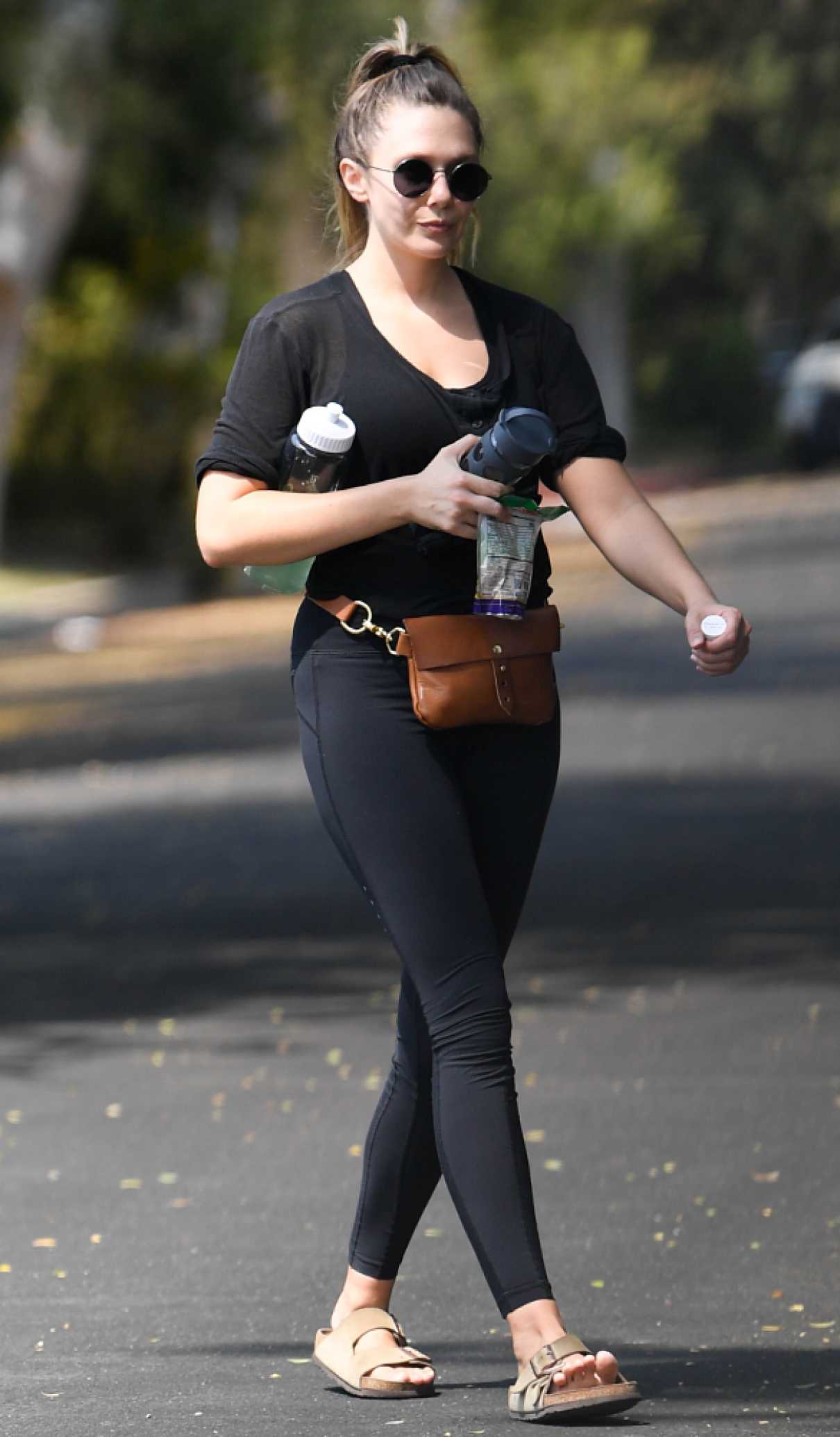 Elizabeth Olsen in a Black Leggings Leaves a Private Gym in Los Angeles