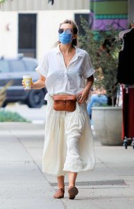 Elizabeth Olsen in a Protective Mask