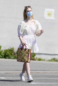 Elle Fanning in a Protective Mask