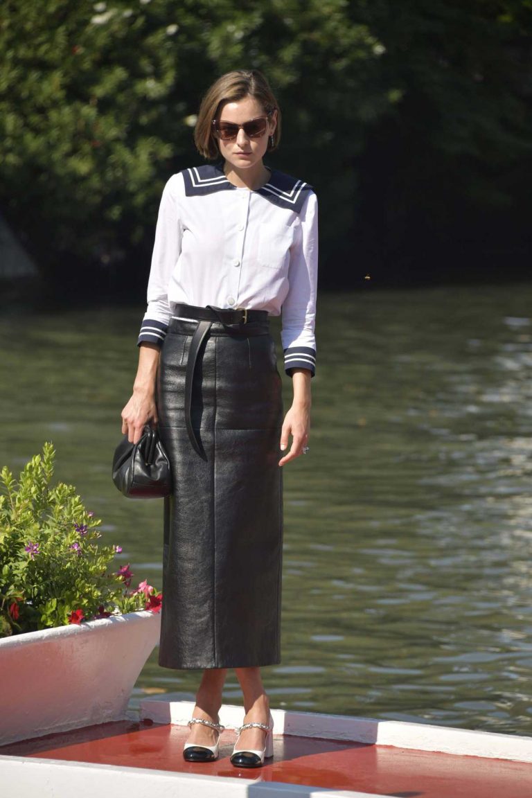 emma corrin knee high boots