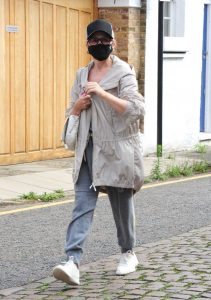Kylie Minogue in a Black Protective Face Mask