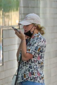 Lili Reinhart in a White Cap