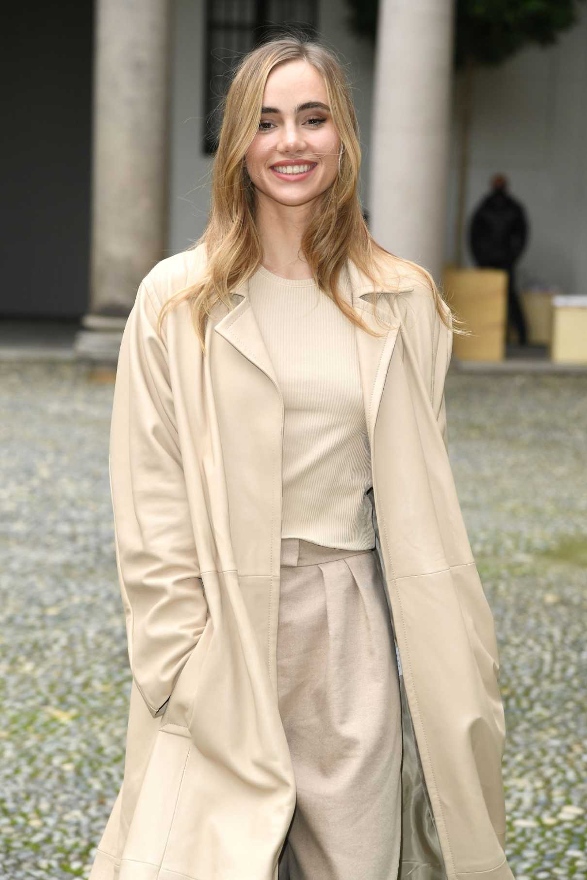 Suki Waterhouse in a Beige Coat Arrives at the Boss Fashion Show During