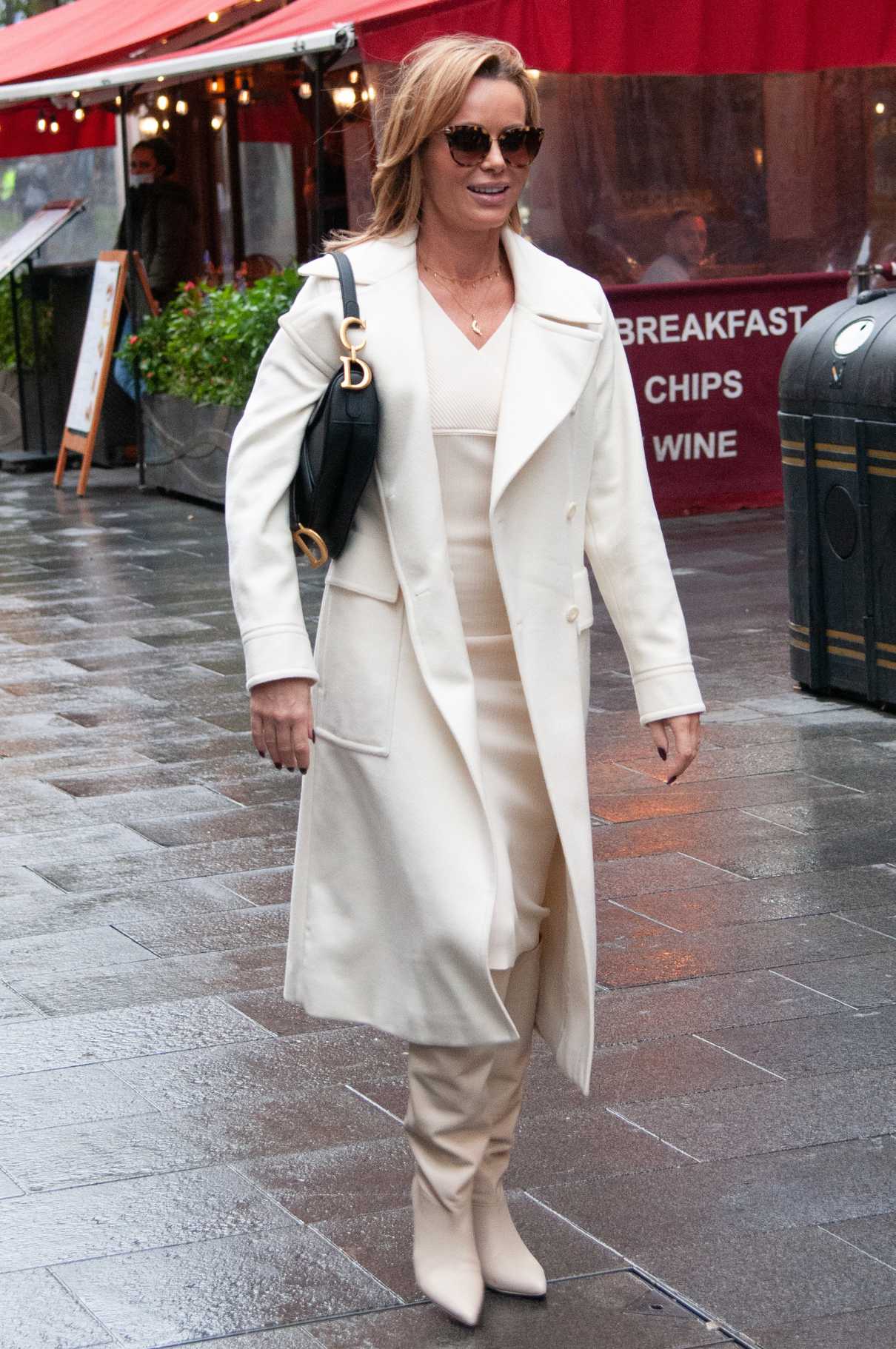 Amanda Holden in a White Coat Arrives at the Global Studios in London ...