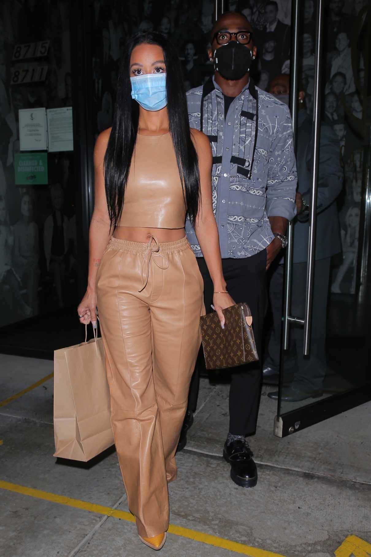 Draya Michele in a Beige Leather Outfit