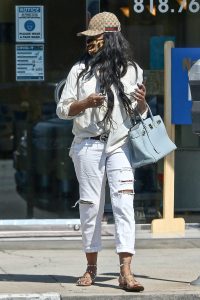 Garcelle Beauvais in a White Ripped Jeans