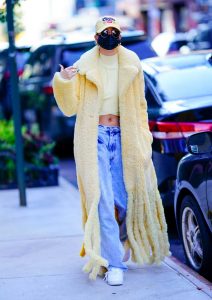 Hailey Bieber in a Yellow Fur Coat