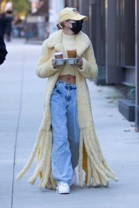 Hailey Bieber in a Yellow Fur Coat