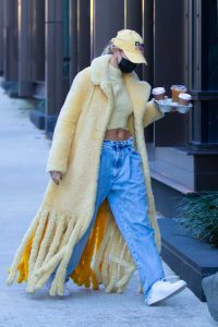 Hailey Bieber in a Yellow Fur Coat