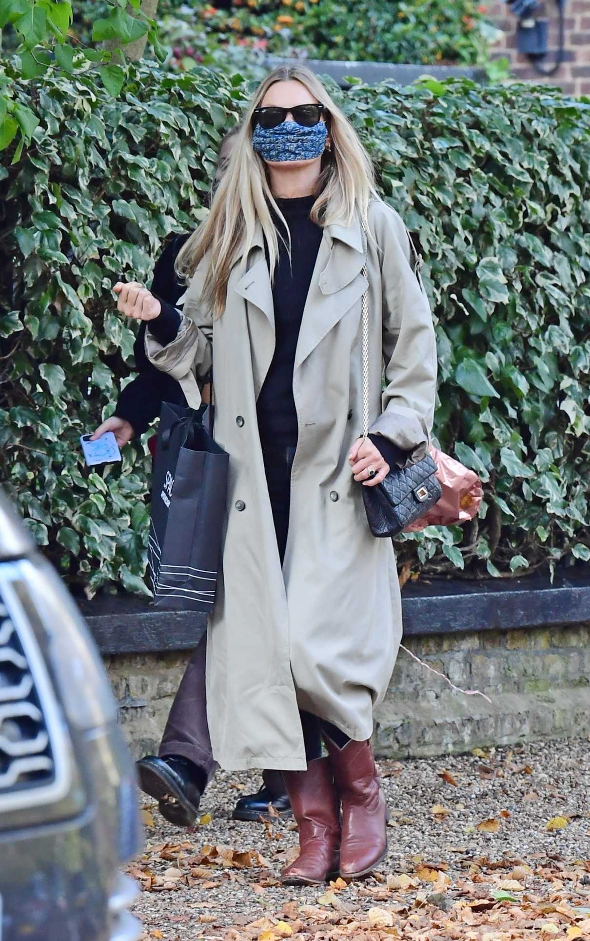 Kate Moss in a Beige Trench Coat Was Seen Out with Her Daughter Lila ...