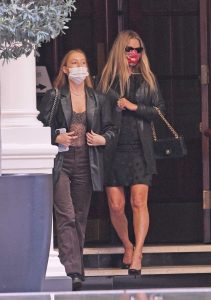 Kate Moss in a Red Protective Mask