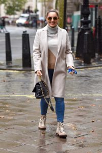 Kelly Brook in a Beige Coat