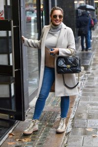 Kelly Brook in a Beige Coat