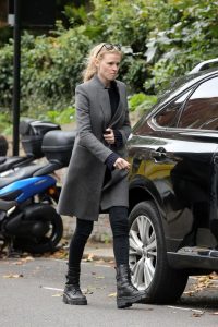 Lara Stone in a Grey Coat