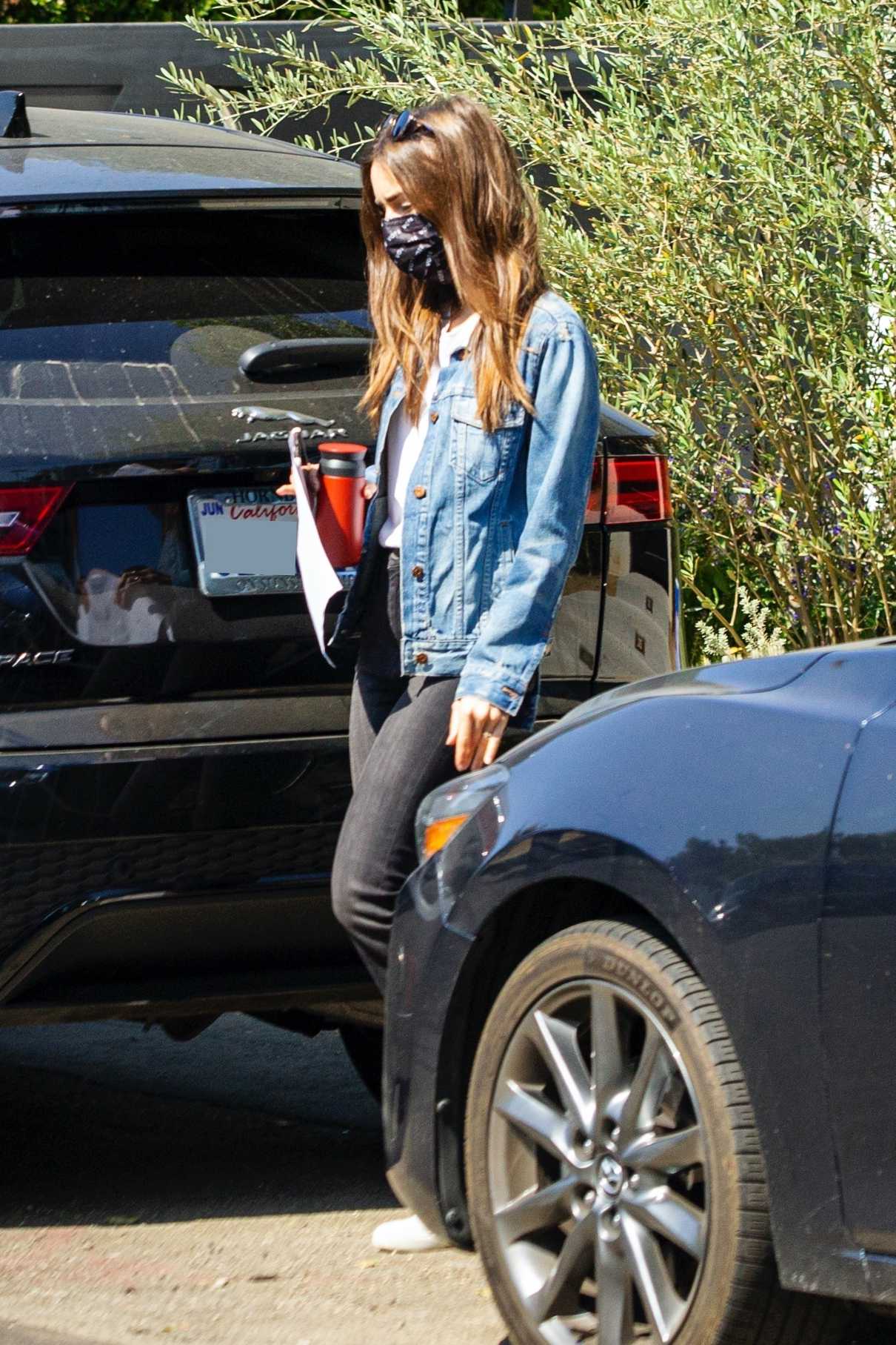 Lily Collins in a Blue Denim Jacket