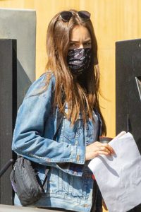 Lily Collins in a Blue Denim Jacket