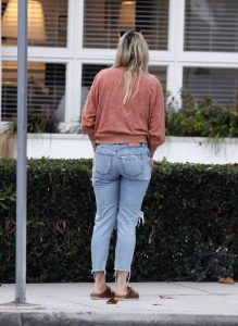 Molly Sims in a Blue Ripped Jeans