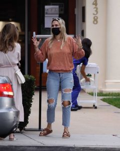 Molly Sims in a Blue Ripped Jeans