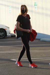 Monica Aldama in a Red Sneakers