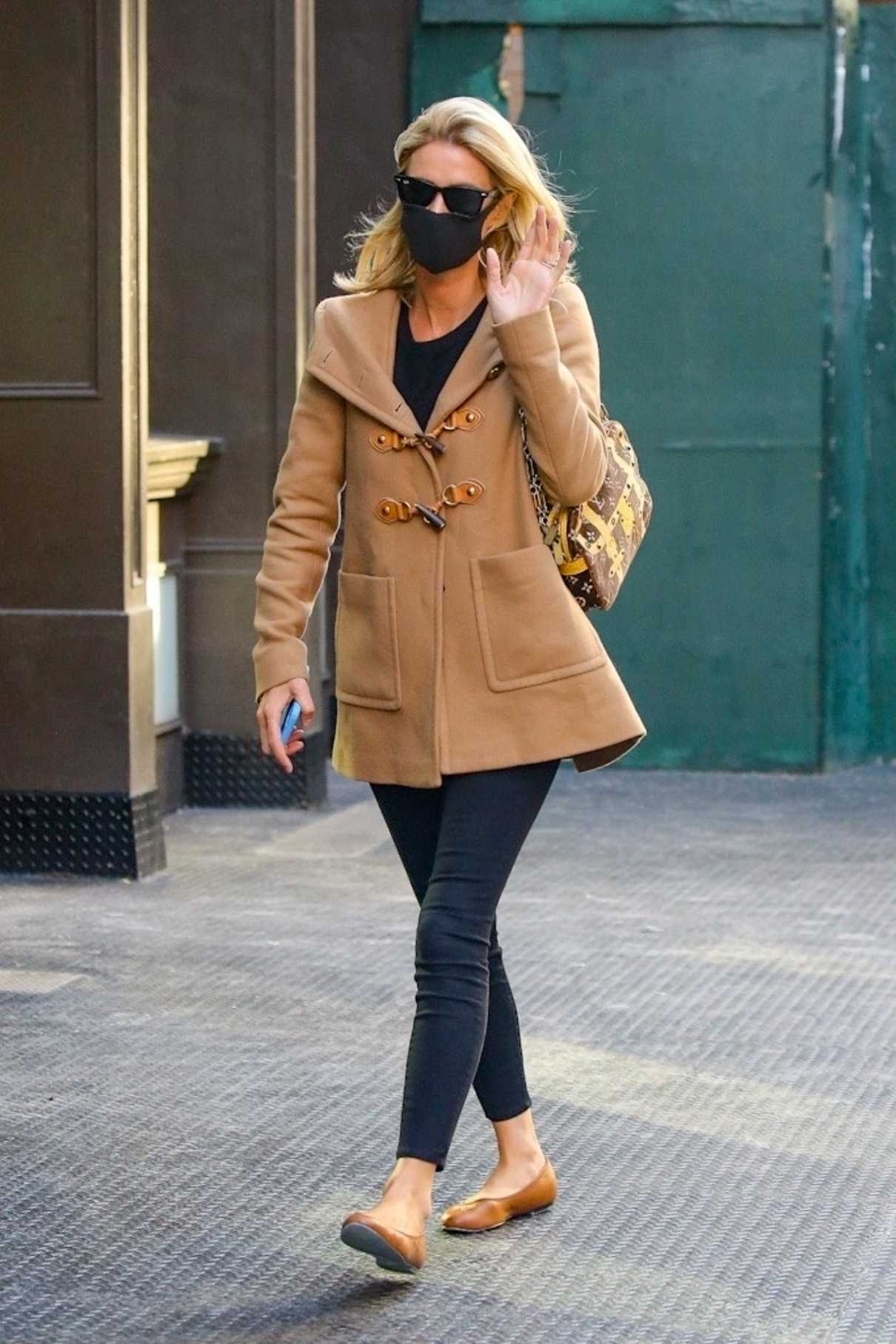 Nicky Hilton in a Beige Coat