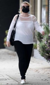 Rebel Wilson in a Black Protective Mask