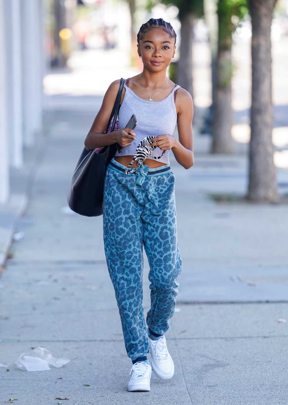 Skai Jackson in a Blue Animal Print Sweatpants Leaves Her Dance ...