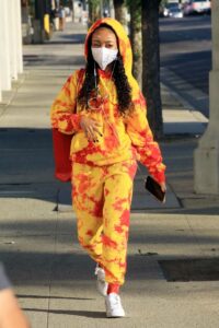 Skai Jackson in a Yellow Tie Dye Sweatsuit